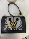 LOUIS VUITTON owl twist handbag