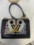 LOUIS VUITTON owl twist handbag