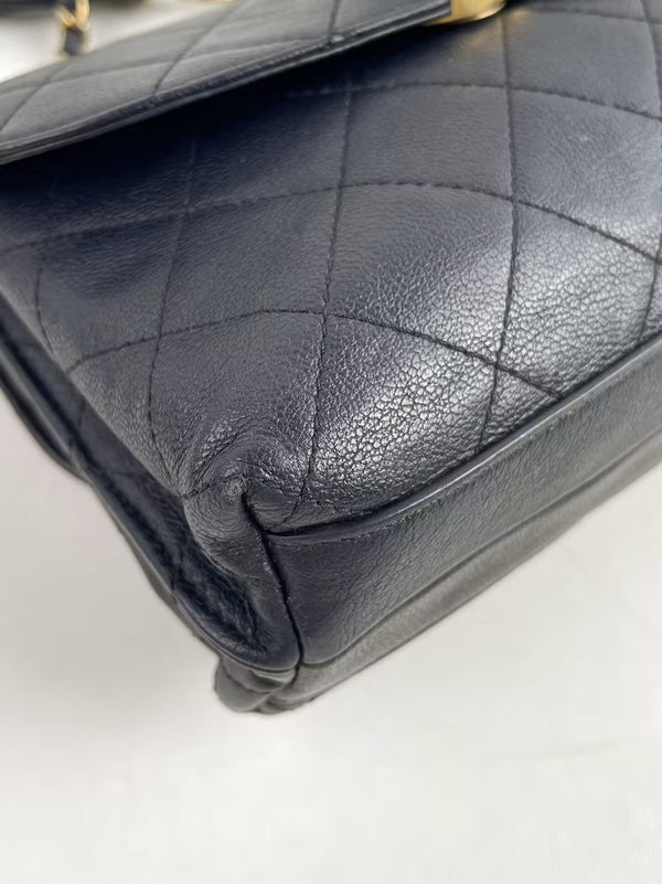 CHANEL Classic Flap Reversible Black Grained Lambskin Leather Medium